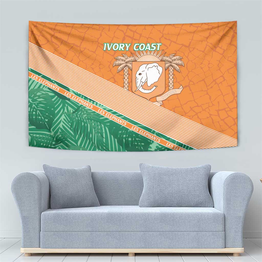 Orange wall tapestry with green stripe, white elephant crest, and 'IVORY COAST' text.