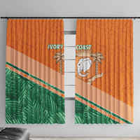 Orange window curtain panel set with Ivory Coast elephant crest and green leaf lower section
