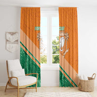 Orange window curtain panels with elephant crest, green foliage, and diagonal orange-white stripe