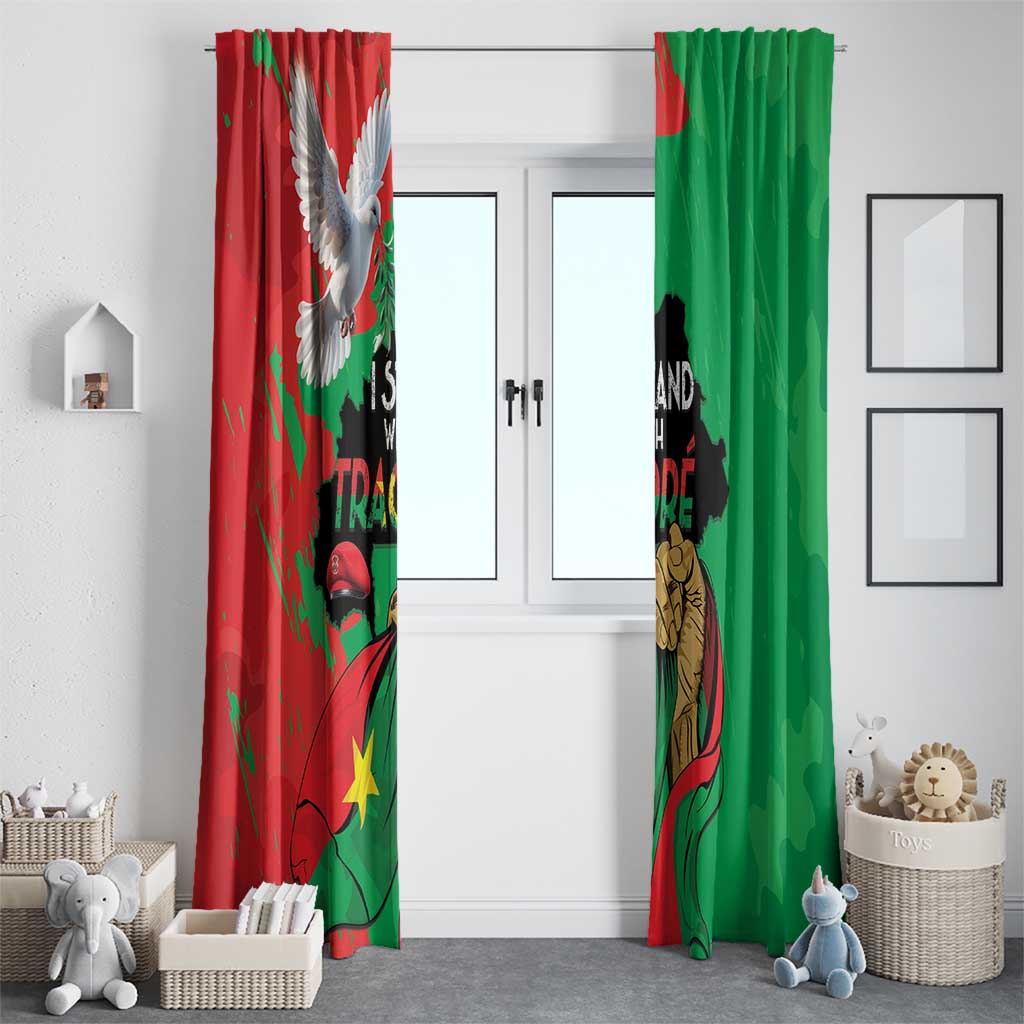 Window curtain panel pair, red and green prints hanging in front of windows