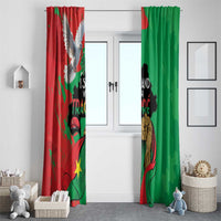 Window curtain panel pair, red and green prints hanging in front of windows