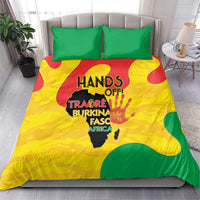Yellow duvet with green graphic print and two matching green pillowcases