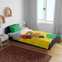 Yellow duvet set with green pillowcases and centered graphic print on a bed