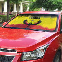 Uganda car sun shade on red pickup, crane emblem and UGANDA text