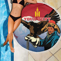 Round beach blanket with white fringe, eagle hunter artwork and 'YOUR TEXT' partly draped