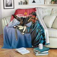 Personalized Mongolia eagle hunter blanket on couch, red and blue eagle and archer graphic