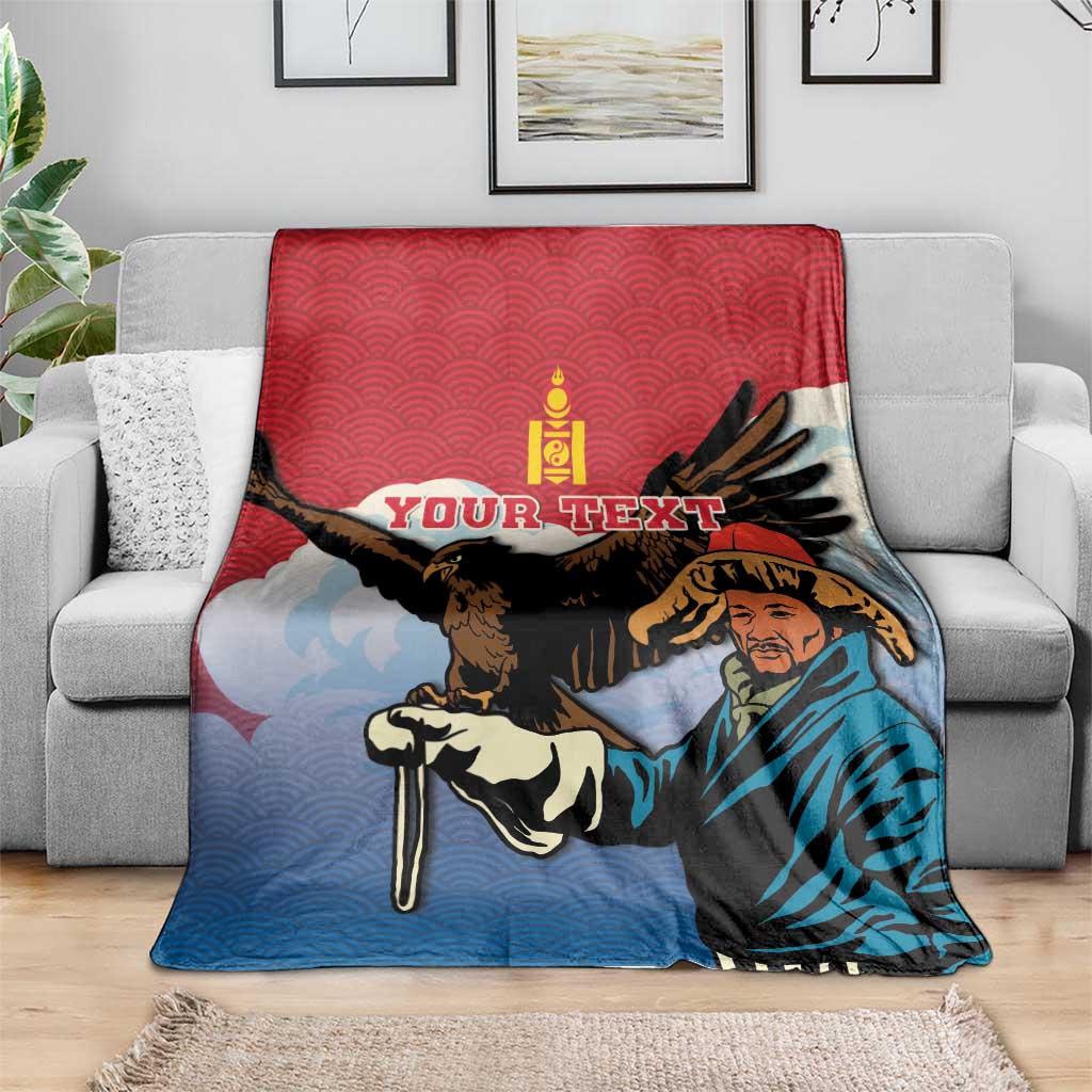 Personalized Mongolia eagle hunter blanket on sofa, red-and-blue eagle and hunter print