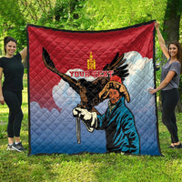 Red and blue eagle hunter quilt displayed outdoors with personalization text