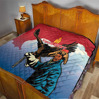 Red, blue quilt with eagle hunter graphic and personalization text across the center