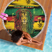 Round beach blanket with lion face graphic, "YOUR TEXT" and white fringe border.