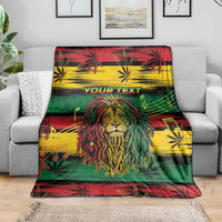 Rastafarian lion blanket spread over couch with “YOURTEXT” and cannabis leaf graphics