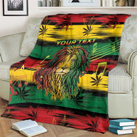 Rastafarian lion blanket folded on chair, featuring lion portrait and red-yellow-green stripes