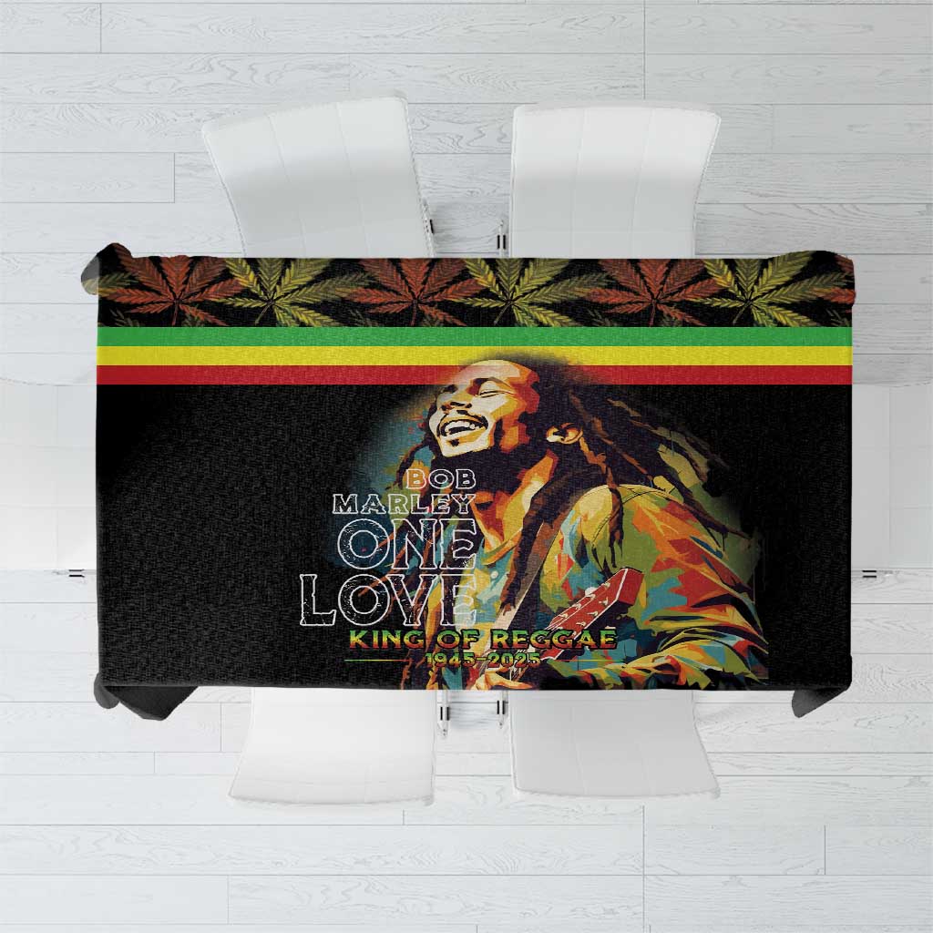 Black tablecloth with colorful Bob Marley graphic, striped border, and One Love text