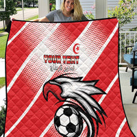 Red Tunisia football quilt with eagle mascot, soccer ball, and white diagonal stripes