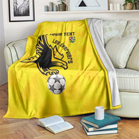 Yellow football blanket with custom text, black lion crest and soccer ball print