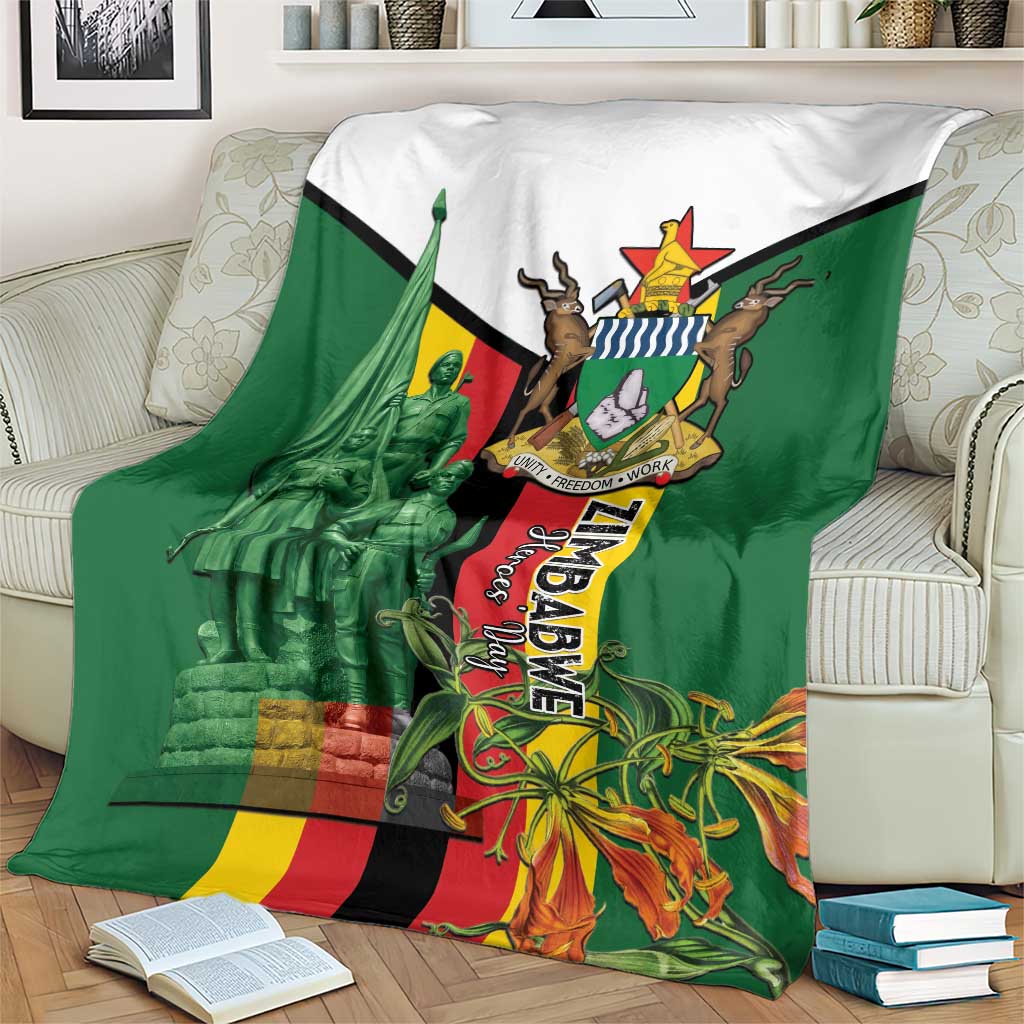 Green and white blanket with Zimbabwe memorial crest, flag colors, and flower artwork