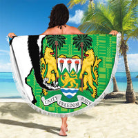Round beach blanket with fringe trim, green-blue chimp coat of arms design, 'Your Text'