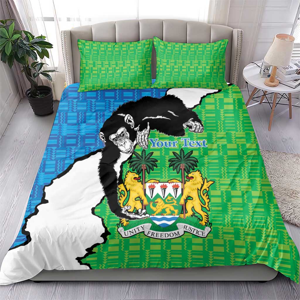 Bedding set on bed: green and blue duvet with Sierra Leone crest and chimpanzee artwork.