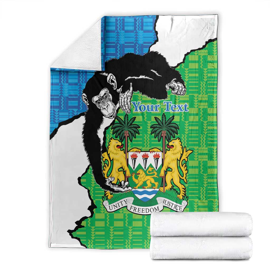 Green and blue Sierra Leone blanket with chimpanzees and coat of arms, folded set