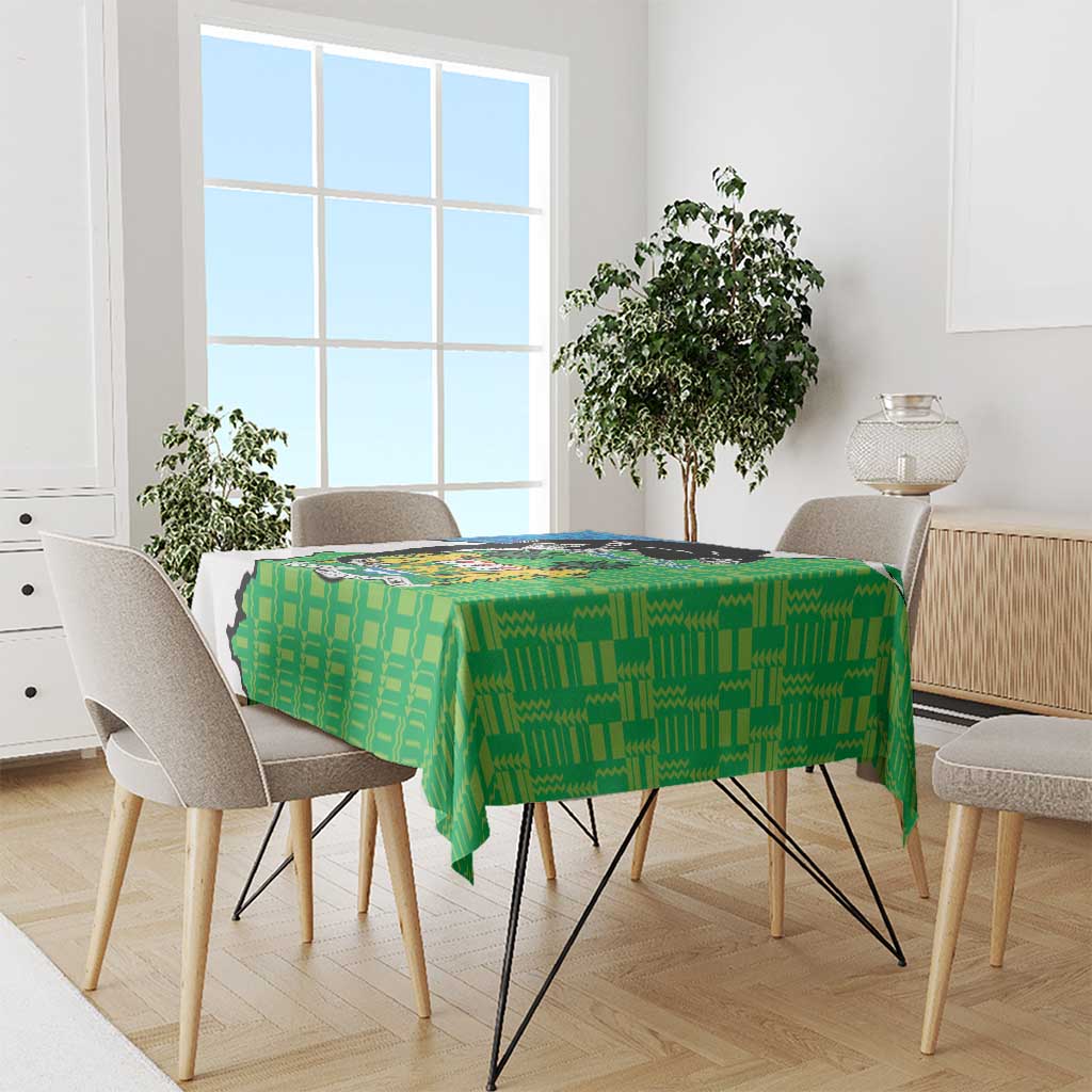 Green personalised tablecloth with repeating pattern and Sierra Leone coat of arms graphic on top