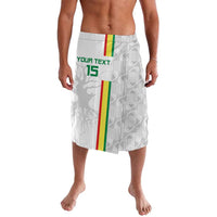 White football lavalava with geometric print, central green-yellow-red stripe, number 15