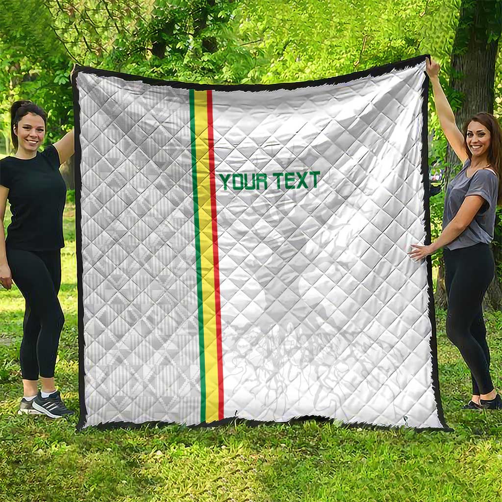 White football quilt with diamond quilting, green-red vertical stripe and 'YOUR TEXT' center