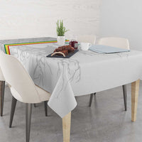 Grey-and-white football-themed tablecloth with player silhouettes and Senegal flag border