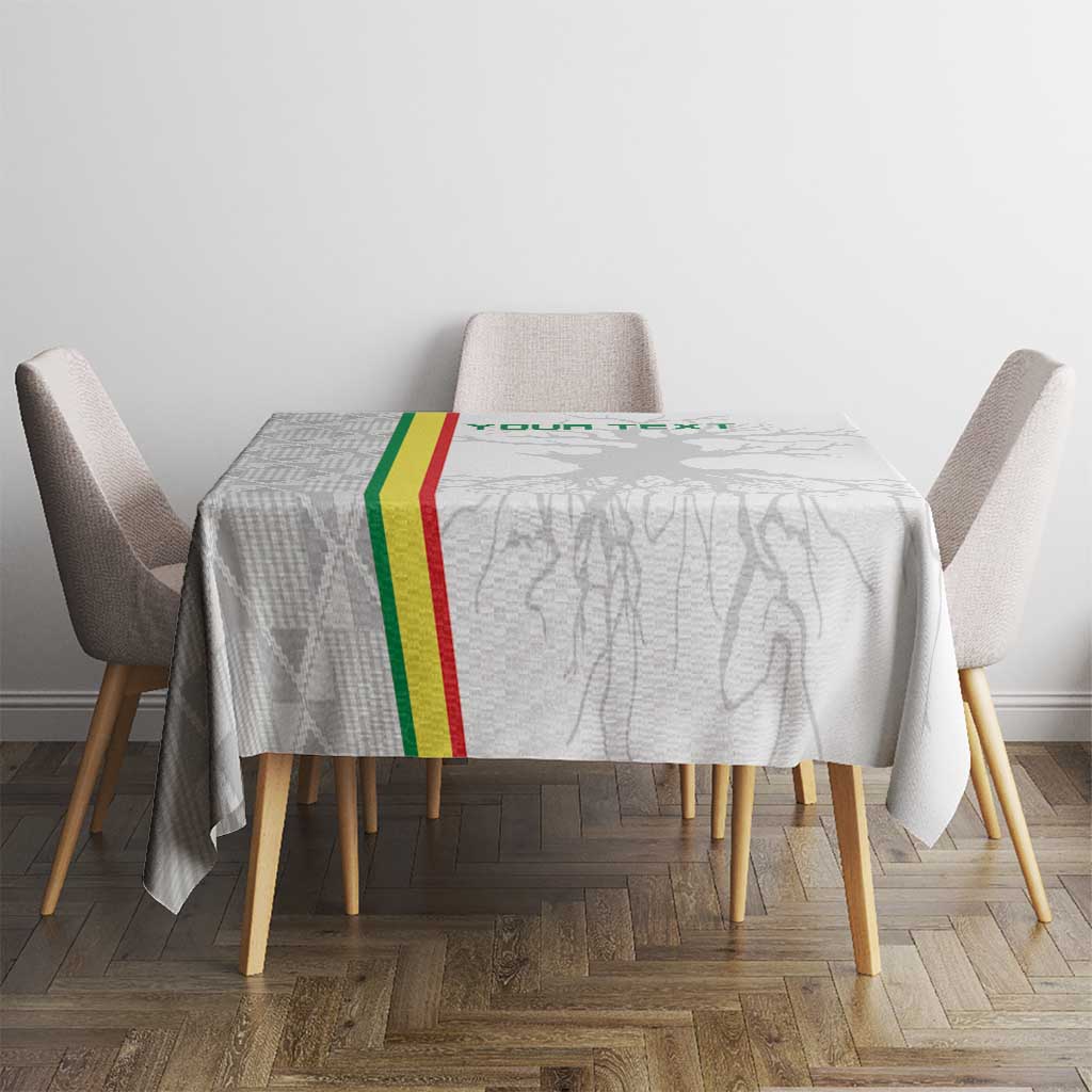 Square tablecloth with grey silhouette graphics and green-yellow-red Senegal stripe