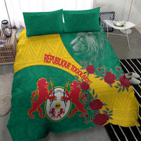 Green and yellow duvet cover with lion coat of arms, lion head graphic, and roses