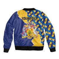 Unisex bomber jacket, dark blue and yellow with flag and flying fish graphic, ribbed trim