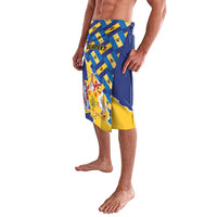 Blue and yellow flag-print lavalava skirt with diagonal paneling and printed crest