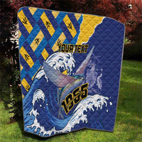 Personalized Independence Day quilt with blue quilted surface, yellow shapes, and bird-fish motif