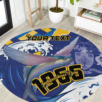 Round blue flying-fish Independence Day carpet with yellow banner text and custom name