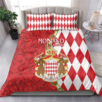 Red and white diamond pillow shams with central coat-of-arms graphic duvet