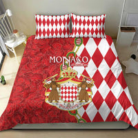 Red and white bedding set with diamond pillow shams and crest emblem duvet