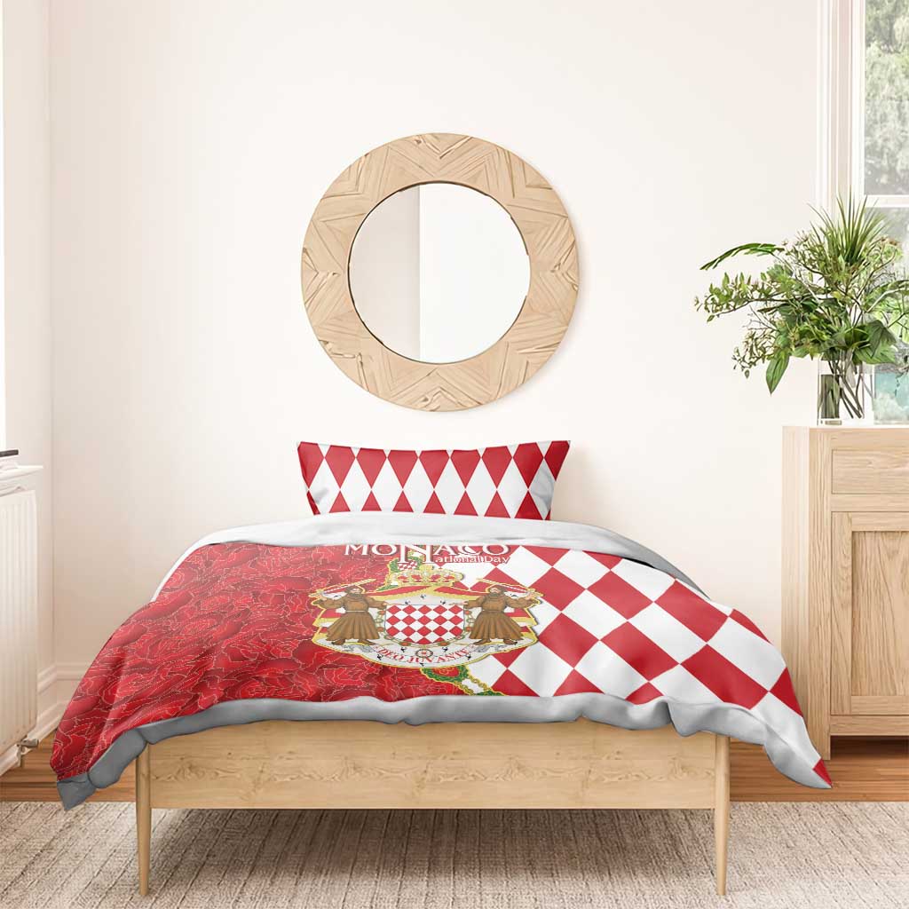 Red and white bedding set with diamond pillow shams and crest emblem duvet