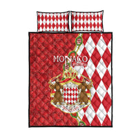 Quilt bed set with Monaco crest center, red floral background and red-white diamond design