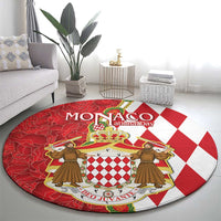 Red and white round crest rug with national day text, shield with diamonds and two figures