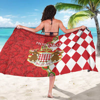 Red and white Monaco crest sarong with diamond pattern, viewed from behind