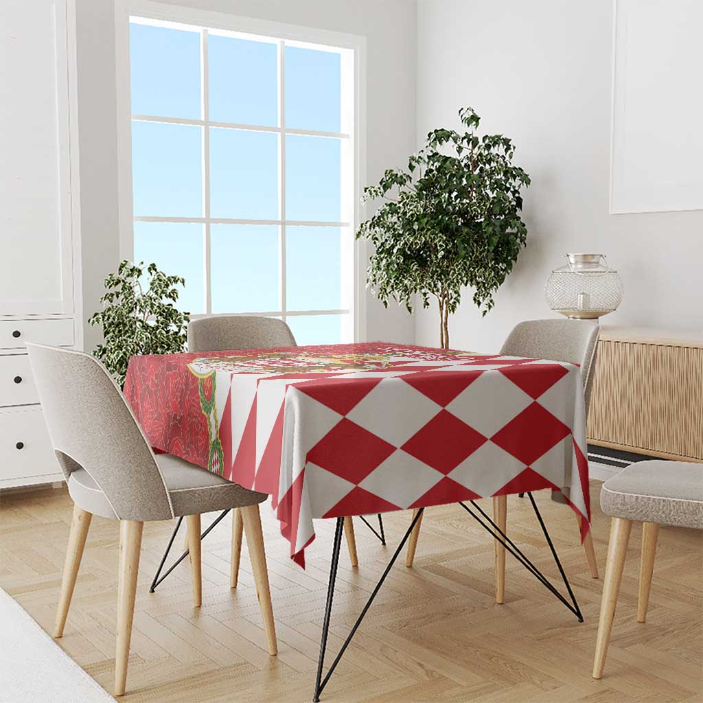Red and white tablecloth with repeating diamond check pattern