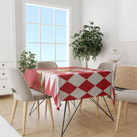 Red and white tablecloth with repeating diamond check pattern
