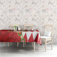 Red and white tablecloth with crest panel and diamond pattern across table