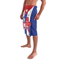 Blue printed lavalava shorts featuring Cuba flag design and Che-style portrait, side view
