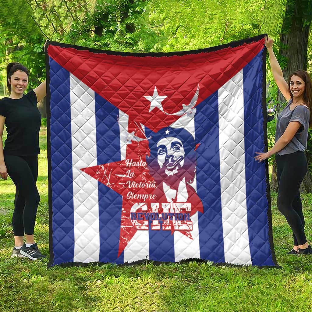 Cuba liberation day quilt spread outdoors with red star, blue stripes, Che Guevara face