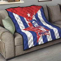 Cuba liberation day quilt folded on living room sofa with Che Guevara graphic