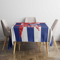 Printed tablecloth with red and blue cross-style stripes and white sections