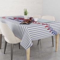 White baseball tablecloth corner with blue pinstripes and red baseball-stitch graphics