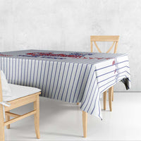White baseball tablecloth with blue pinstripes and red stitch baseball graphics on bench