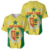 Pair of yellow baseball jerseys showing Senegal front and 'YOUR TEXT' back crests