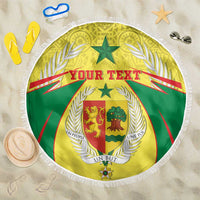 Round beach blanket with white fringe, green and yellow coat of arms crest, “Your Text”